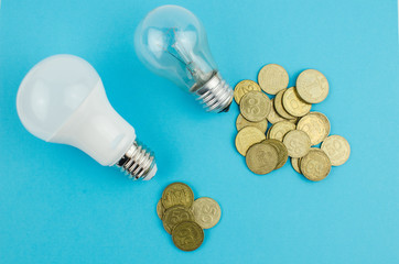 incandescent lamp and energy saving on a blue background