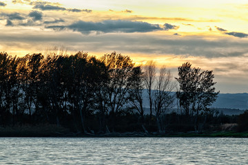 landscape in a lake at sunset