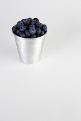 Blueberries in aluminum cup