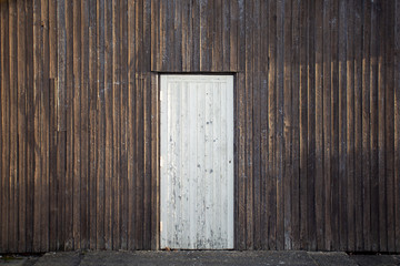 Old timber wall with timber door