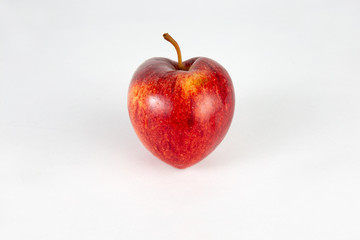 Red apple in shape of heart
