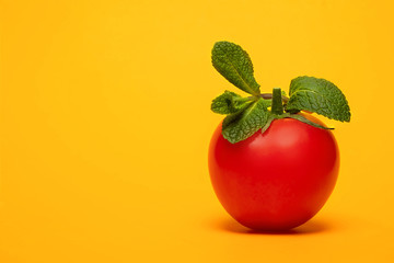 tomato on a yellow background