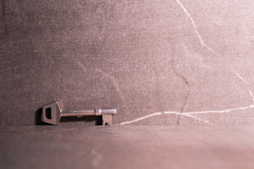 A key and stone background.