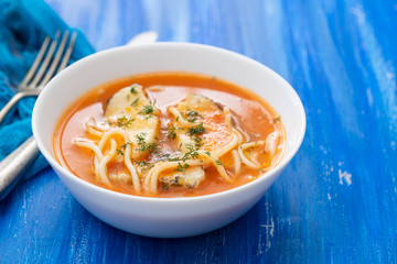 fish soup in the white bowl
