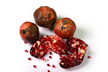Juicy pomegranate on white background