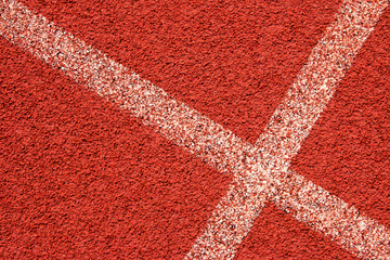 Red running track Synthetic rubber on the athletic stadium.