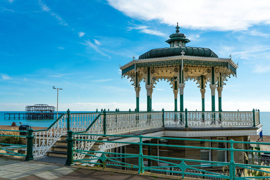 Brighton Pier Beach with Victorian bandstand octagonal pavilion Chinese and Indian style in the background at Brighton Sussex, UK.
