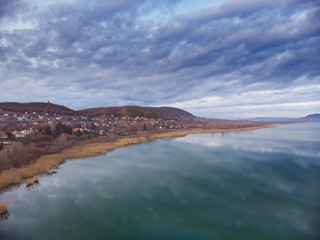Fototapeta na wymiar Nice clouds reflection on the lake Balaton in Hungary