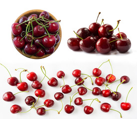Naklejka na ściany i meble Set of fresh cherries. Fresh red cherries lay on white isolated background with copy space. Cherries in a bowl. Background of cherries. Ripe cherry on a white background. Cherry fruit.