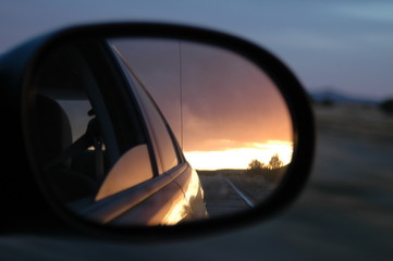Fototapeta premium Sunset in my side mirror