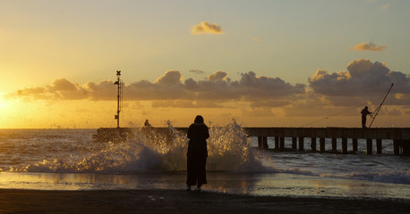 Fototapeta na wymiar woman in the sunset