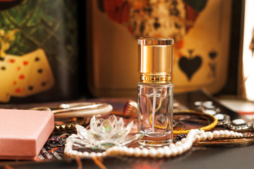 Glass perfume bottles based oils. A Bazaar, market. Macro. Gold and pink gamma