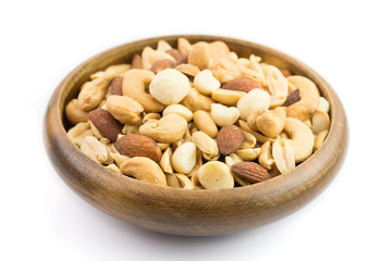 Mixed nuts in a bowl on a white background