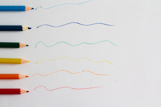 lines from crayons on white paper.