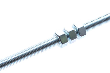 Screw-thread axis with three nut isolated on white background