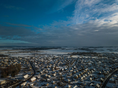 Aerial landscape view of small town in Lithuania, Joniskis. Sunny winter day.