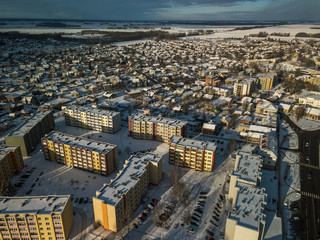 Aerial view of small town in Lithuania, Joniskis. Sunny winter day.
