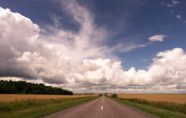 Summer road and blue sky background