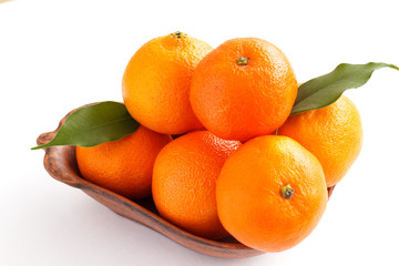 Tangerines, clementines isolated on white. Close-up.