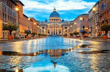 St. Peter's Basilica in the evening from Via della Conciliazione in Rome. Vatican City Rome Italy. Rome architecture and landmark.  St. Peter's cathedral in Rome. Italian Renaissance church.