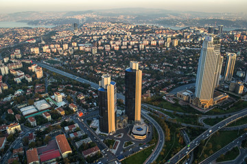 Fototapeta premium ISTANBUL, TURKEY - AUGUST 23: Skyscrapers and modern office buildings at Levent District. With Bosphorus background. August 23, 2014 in Istanbul, Turkey.