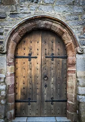 Fotobehang Kasteel middeleeuws kasteel houten deur