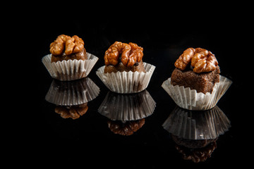 three healthy useful organic handmade candies with walnuts