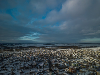 Aerial view of small town in Lithuania, Joniskis. Sunny winter day.