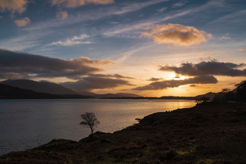 Fototapeta na wymiar A sunset over Loch Linnhe near the Corran Narrows and Ardgour, Lochaber, Scotland.
