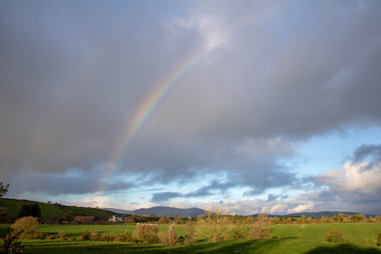 Rainbow over a farmers field in the South West of Ireland © Corey