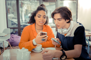 Teenagers sharing their experience of using new app