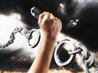 Fist smashes the fetters. Chains in the form of procent sign. Concept freedom from the chains of...
