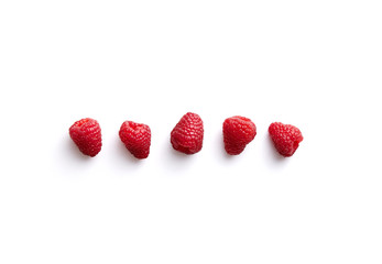 Various raspberries isolated on a white background viewed from above. Top view. Copy space.