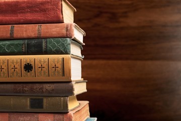 Old Books stacked on background.