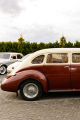 Side view of a retro car of brown color