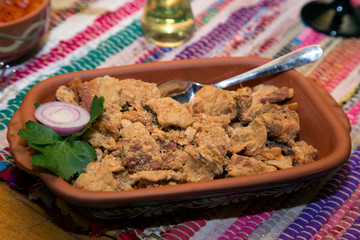 Serbian Traditional Food-Salty Fried Pork Greaves Served In Crockery Close Up