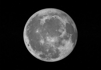 Moon on the dark sky with stars.