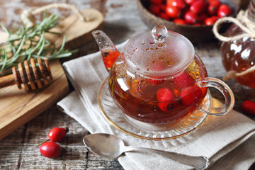 Vitamin beverage. Rose hip tea, rosemary and berries