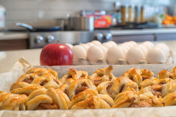 Homemade apple patries on a counter top in a kitchen