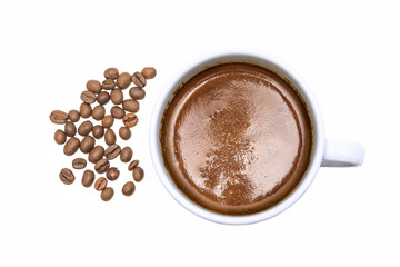 cup Turkish coffee and coffee beans isolated on a white background.Top view.