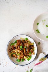 Bowl of Chilli fish teriyaki in garlic soy sauce, top view