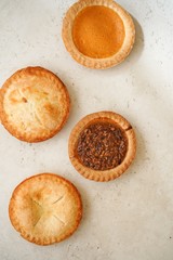 Different various types of mini pies background