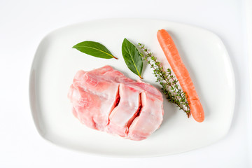 Top view fresh leg raw rabbit 's meat cutting ready for cooking in pieces put on white...