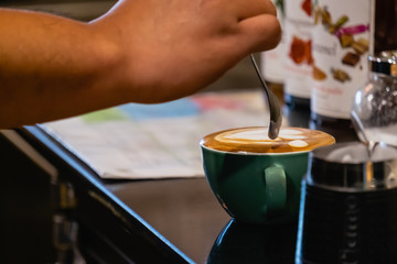 Fototapeta na wymiar barista make coffee latte art