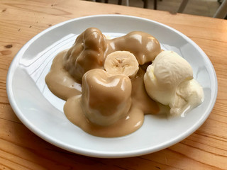 Profiteroles with Tahin / Tahini Sauce and Banana Slice Served at Restaurant.