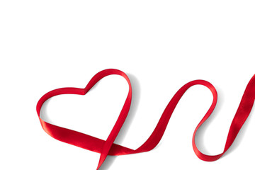 Heart shaped red ribbon for Valentine's day celebration on an isolated white  background
