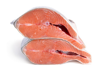 Pieces of pink salmon isolated on white background