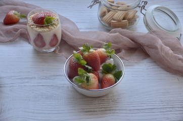 fresh strawberry  in a bowl  dessert  with biscuit