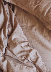 bedding items bed beige pillow blanket textiles