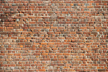 Naklejka premium Red brick wall background